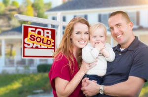 Family with Sold Sign