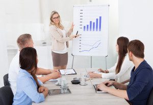 business meeting with chart presentation - featured image