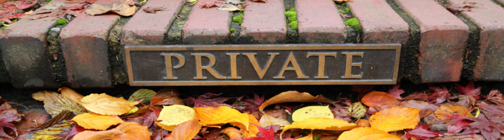 Brick steps with a brass Private plaque.