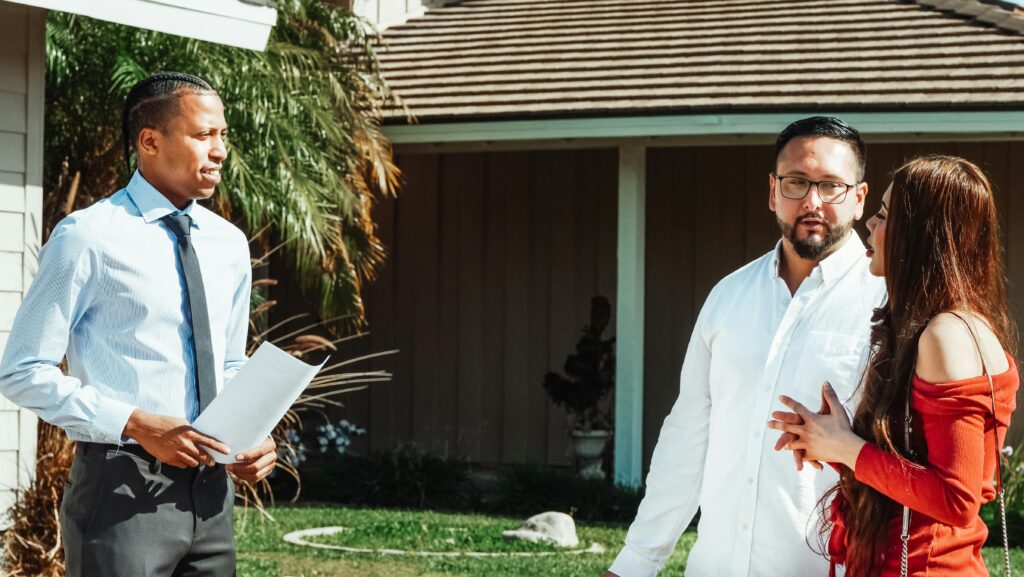 couple consulting a cash buyer