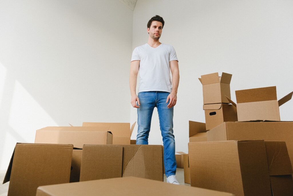 man packing stuff ready to move