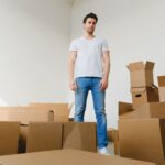 man packing stuff ready to move