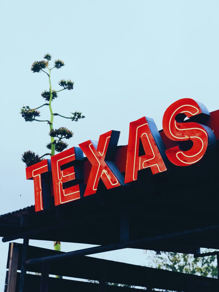 sign with the word "Texas" on it